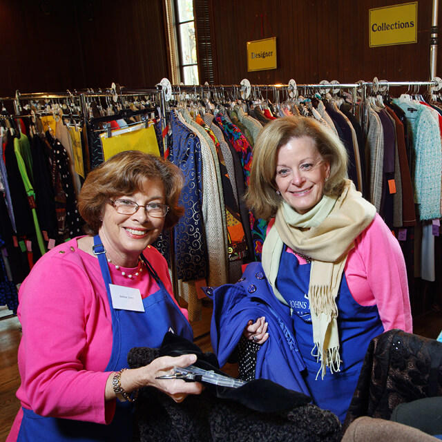 The photo shows people shopping.