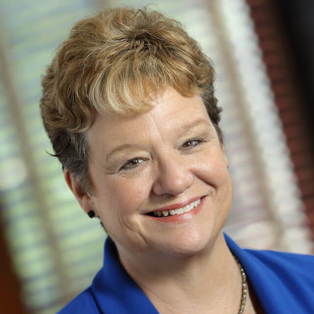 A photo shows Deborah Baker.