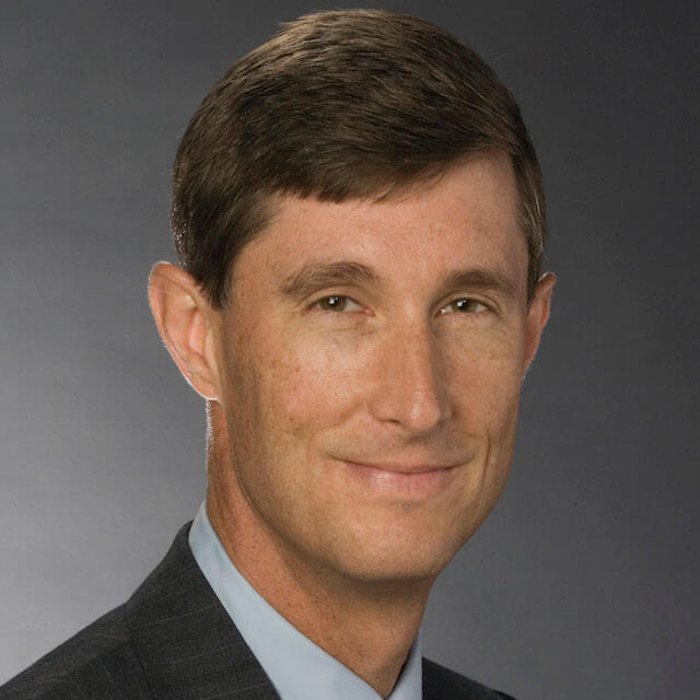 A photo shows Eric Bass.