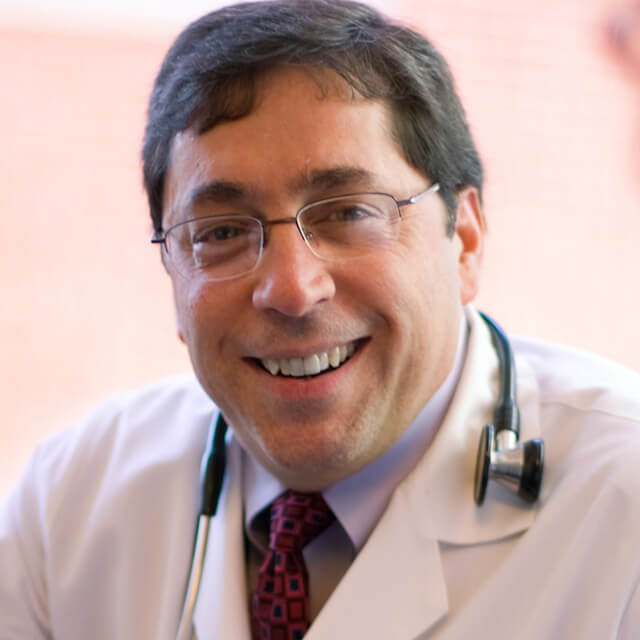 A photo shows Gordon Tomaselli.