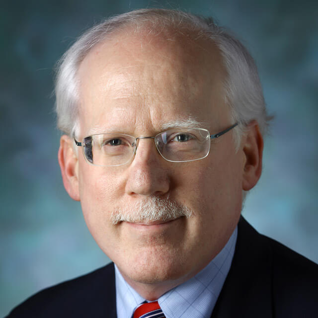 A photo shows Robert Wood. 