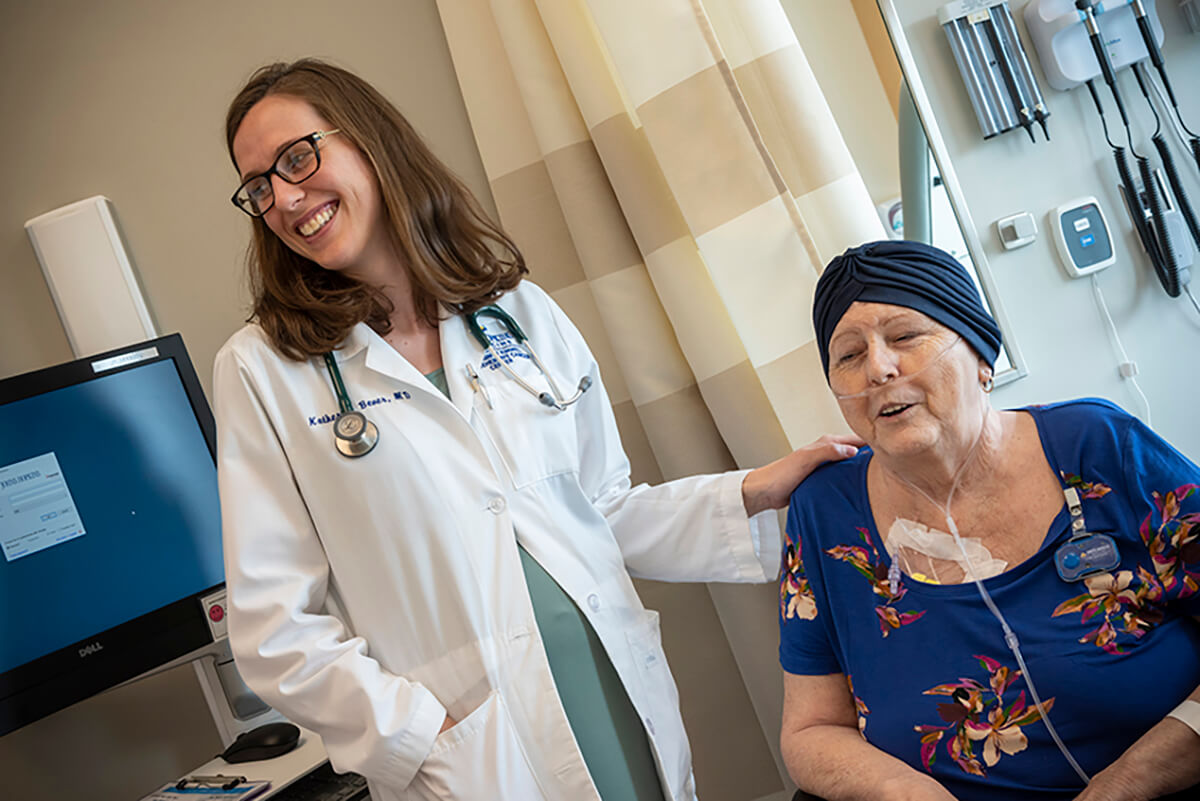 Katherine Bever, M.D. with a patient