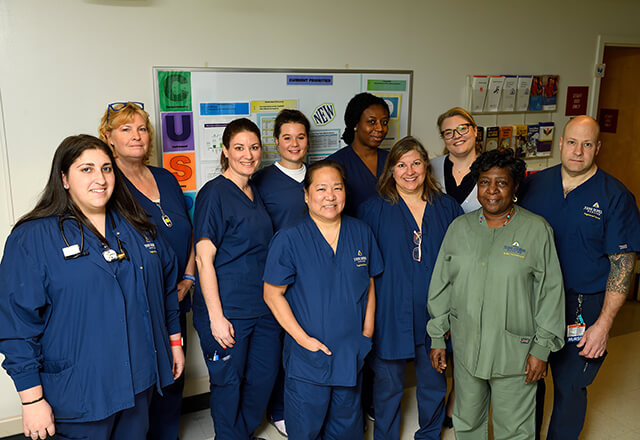 A group of Burn Center nurses stand together.