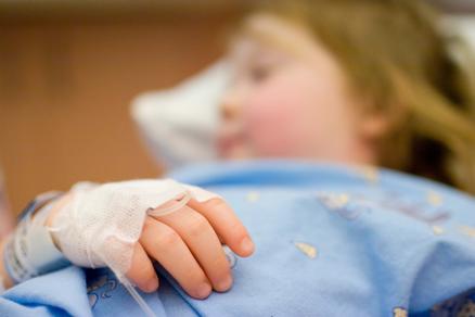 child in hospital bed