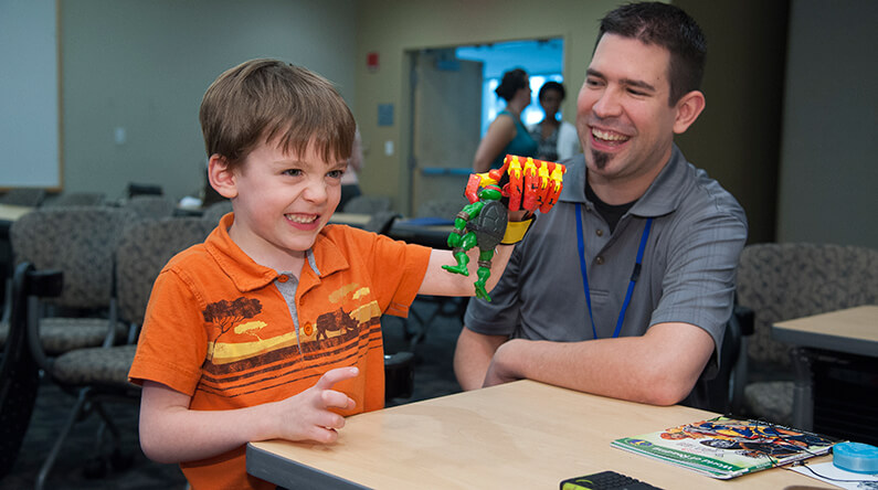 child with a 3-D printed hand