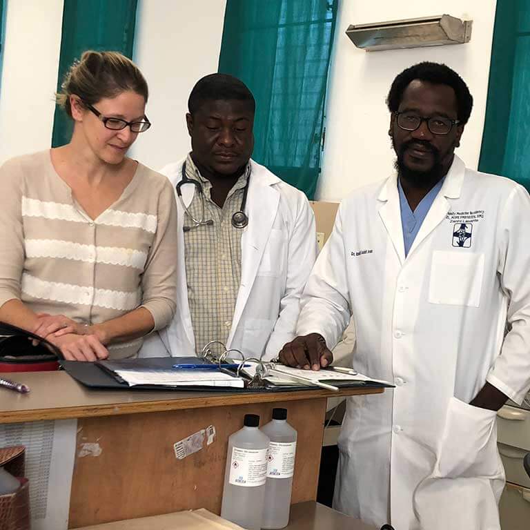 Dr. Schiess with colleagues in Haiti