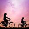 Mother and son riding bicycles
