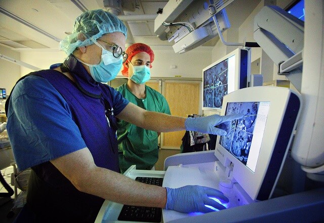 Dr. Anderson using imaging in the OR