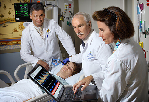 photo of the Lab physicians performing the TCD test on a patient