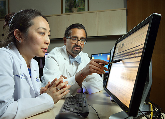 Physicians reviewing data