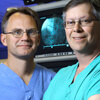 Jon Resar and John Conte are studying a minimally invasive approach for placing an aortic valve. 