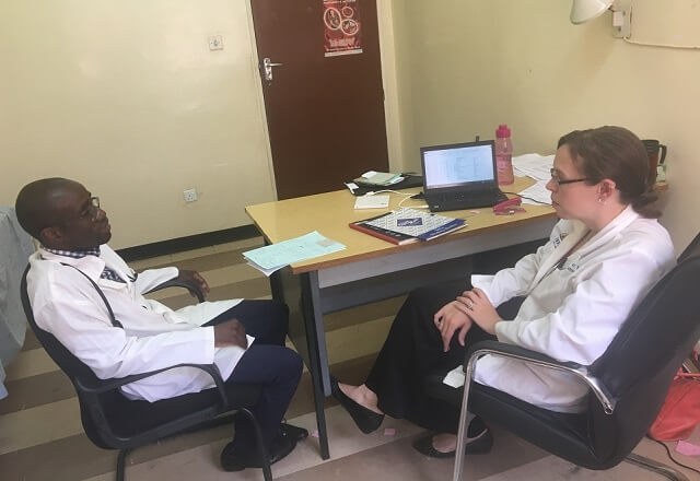 Dr. Saylor training a colleague in Zambia
