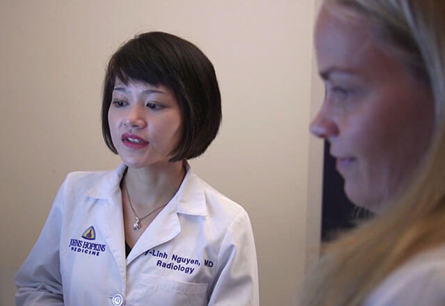 Molecular Imaging program co-director Dr. Lilja Solnes with resident My-Linh