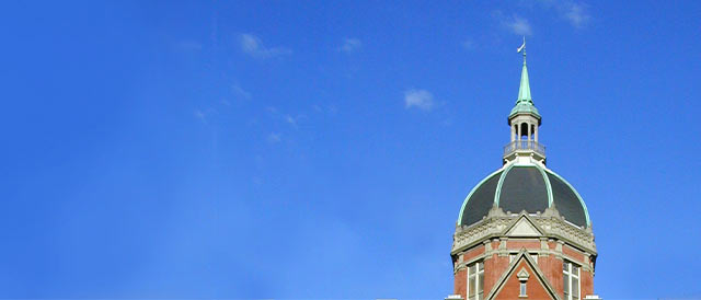 Johns Hopkins dome set against a sunny blue sky