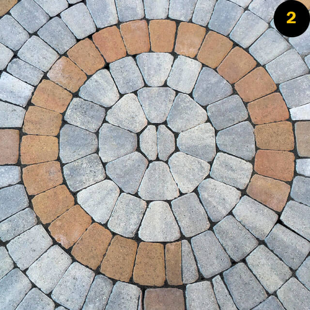 bricks in a labyrinth pattern in garden