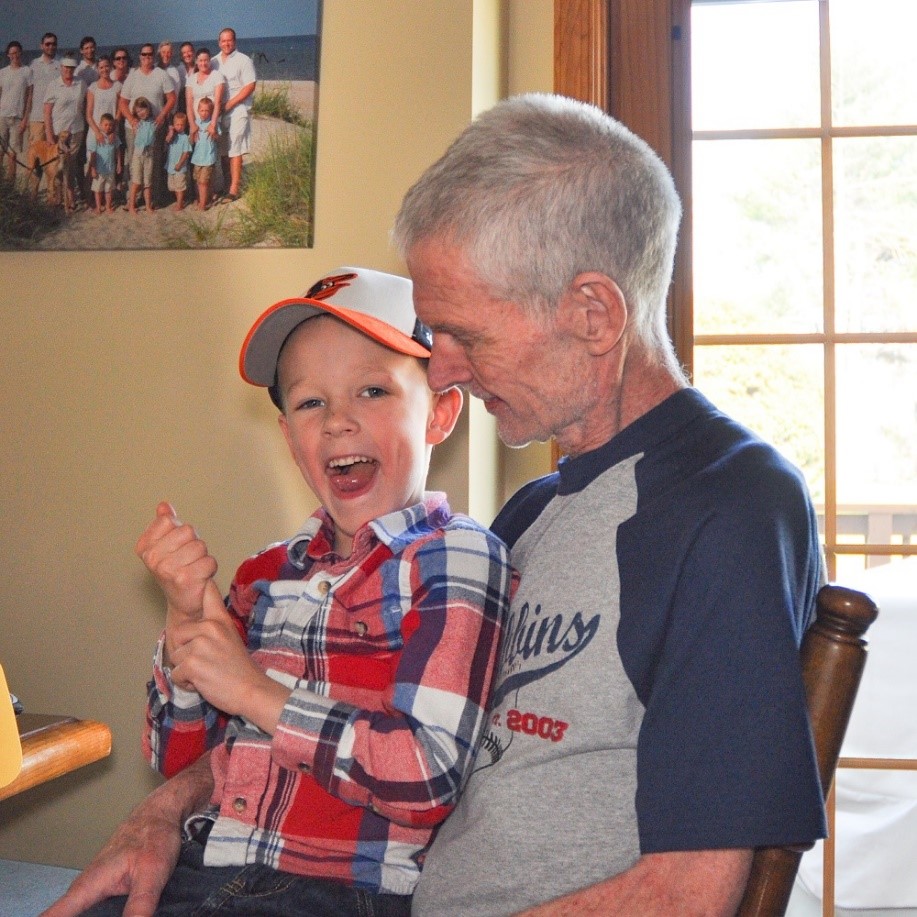 Jim Pryce, with his grandson, 2014. (Photo courtesy of Kim Pryce.)