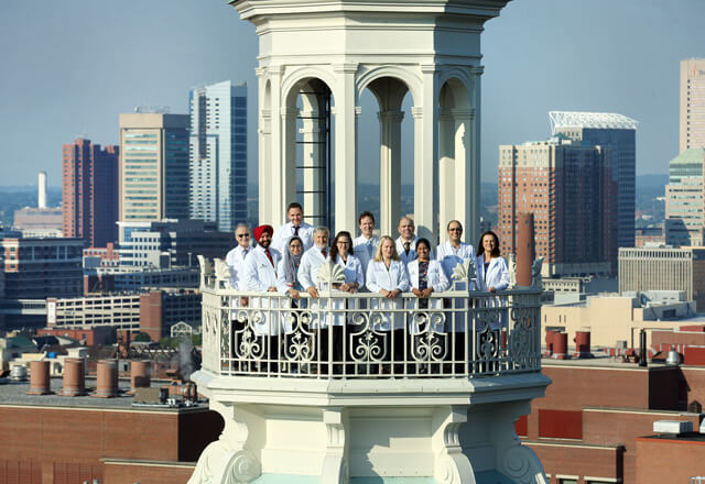 Residents standing on the Johns Hopkins Dome