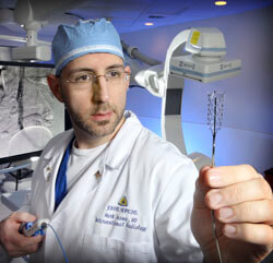 Mark Lessne uses a variety of minimally invasive approaches to open vein blockages.