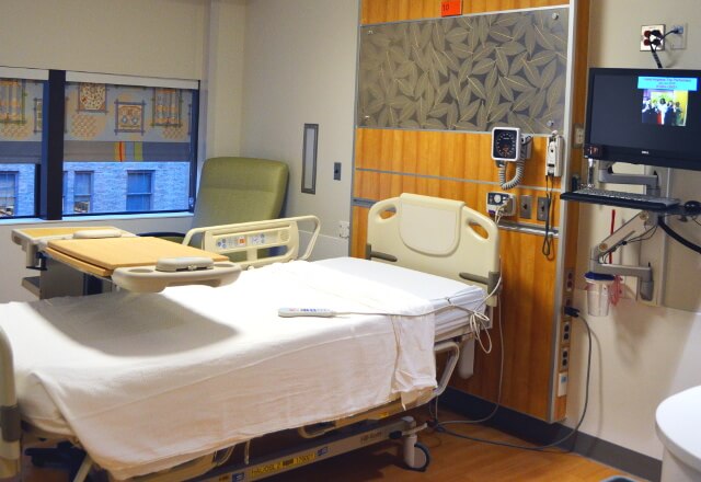 An empty bed in a Johns Hopkins inpatient rehabilitation unit.