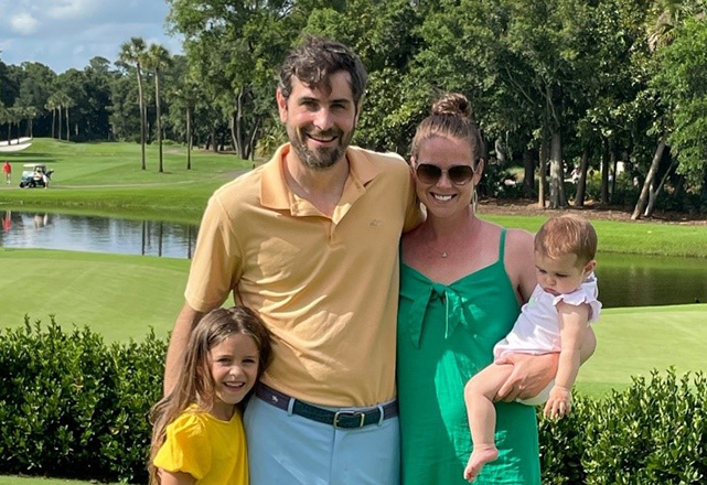 gynecologic oncology - maggie pictured with her husband and two daughters in golf park