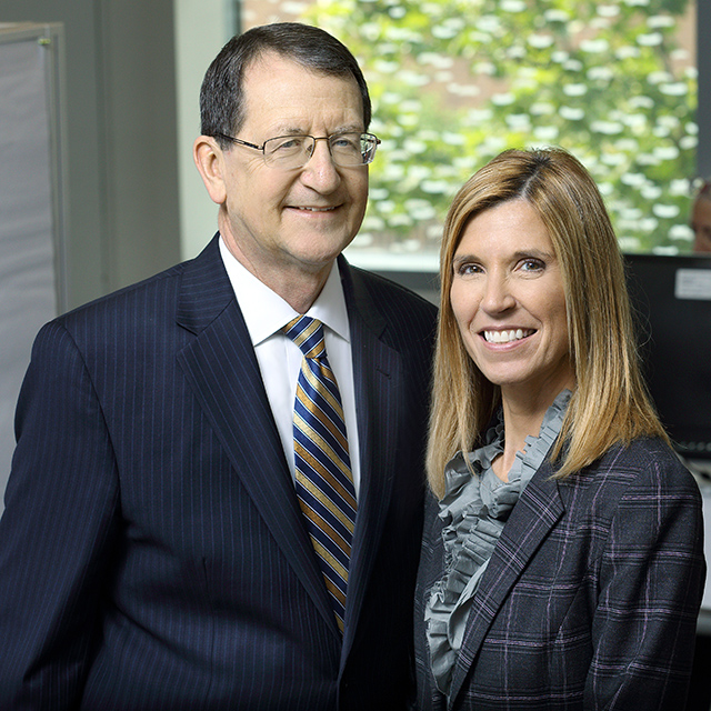 A photo shows Ronald Peterson and Redonda Miller. 