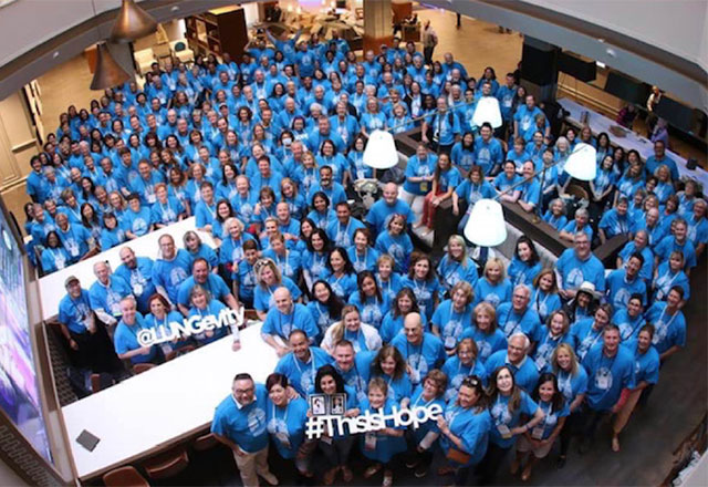 Fundraising group in blue tshirts.