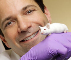 Andrew Lane, M.D., with a 'stuffy nose' mouse