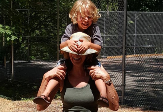 Kundry holding her grandson.