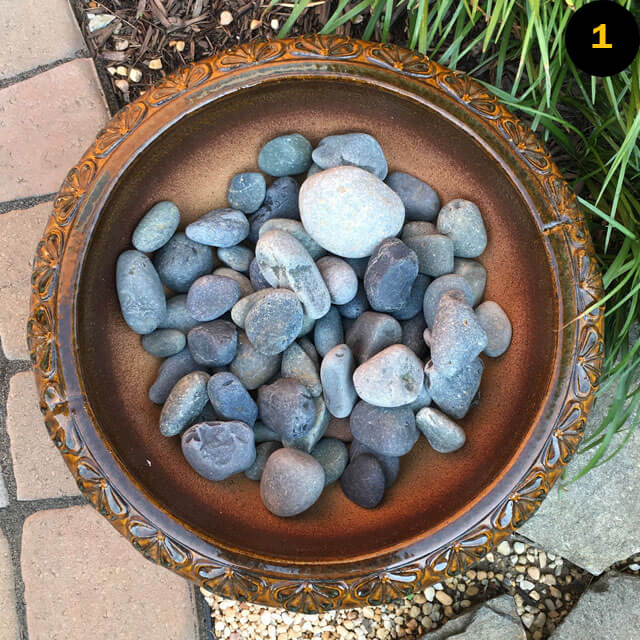 tribute stones in dish for people to place