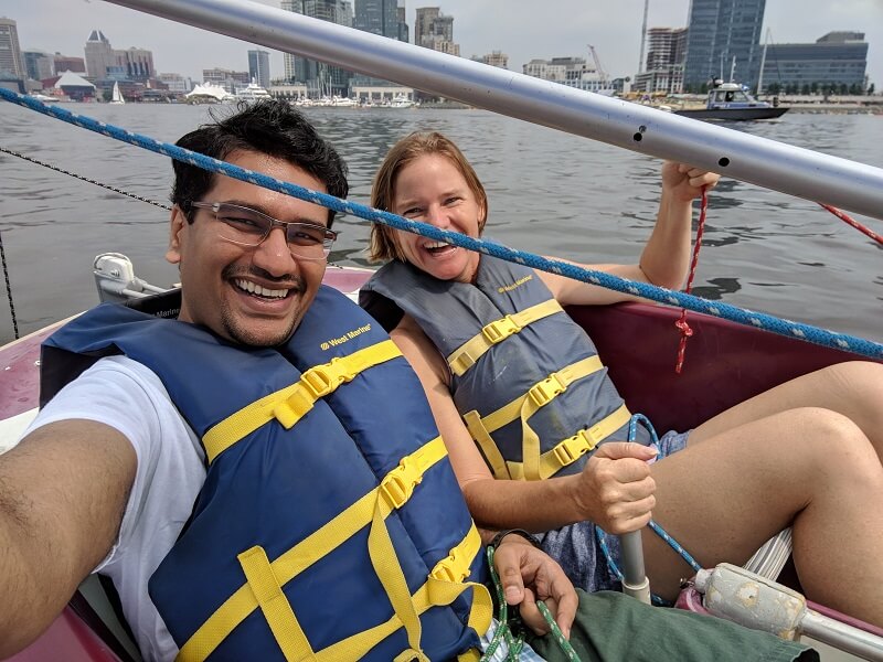 Two fellows in a boat during an adaptive sailing class