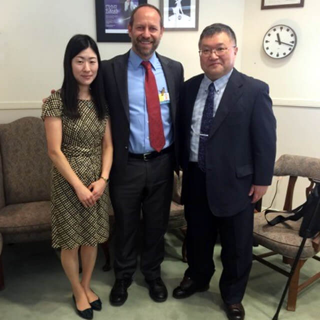 Professor Eiichi Saitoh, Dr. Pablo Celnik and associate professor Yoko Inamoto posing for a photo