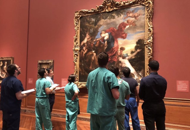 Students admiring a painting