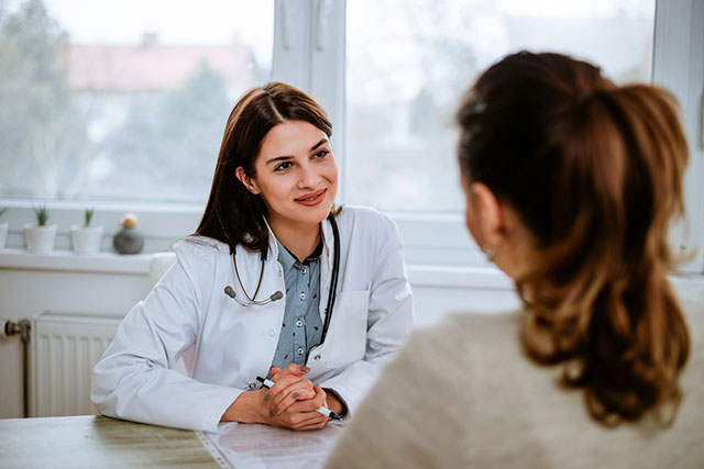 Patient consulting with physician